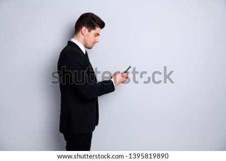 Profile side view photo concentrated youth ceo have conversation chatting messages colleagues friends marketers think thoughtful solve work problems fashionable outfit isolated argent background