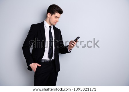 Portrait of handsome charming investor investment have conversation use modern technology get message solve work problems feel worried dressed modern classic blazers isolated on argent background