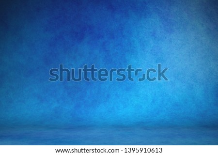Studio portrait backdrops traditional painted canvas or muslin fabric cloth studio backdrop or background, suitable for use with portraits, products and concepts. Dramatic, blue modulations