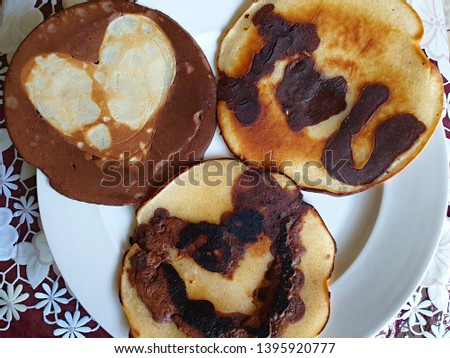 tasty pancakes with romantic pictures