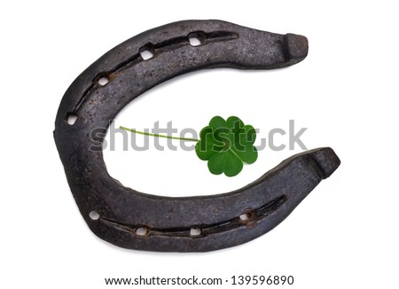 horseshoe and a four-leaf clover symbolizes good  luck