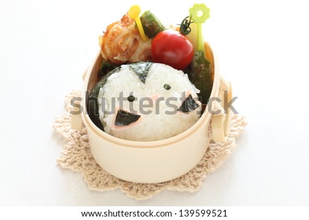 Japanese food, homemade decoben decorated benton on white background with copy apce