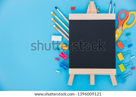 Top view tool set for education children on blue  background, back to school concept
