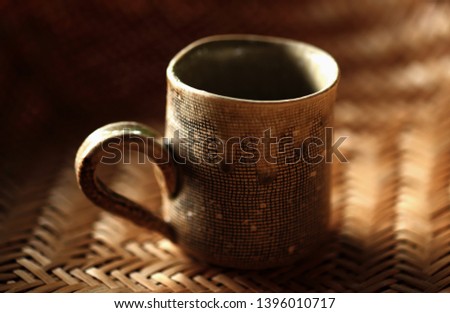 blurring Pattern and shape of a coffee cup ceramic Thailand. 