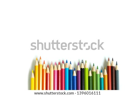 Colored pencil on isolated white background. 