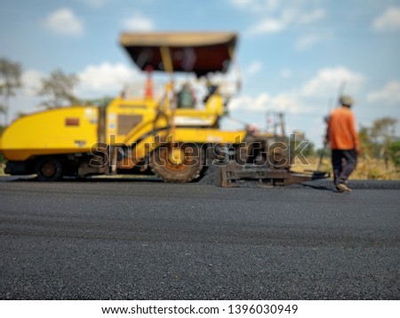 Asphalt road construction in Thailand, blurred images