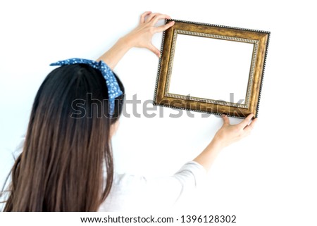 home decoration concept. put the photoframe on the wall and white background