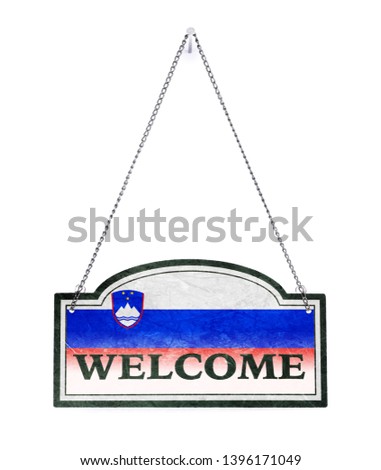 Slovenia welcomes you! Old metal sign isolated on white