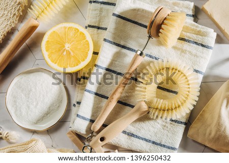 Natural cleaning products lemon and baking soda with bamboo dish brushs. Eco friendly. Zero waste concept. Plastic free. Royalty-Free Stock Photo #1396250432