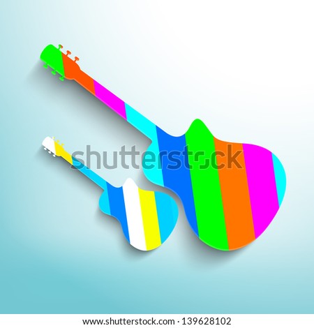 Colorful Guitars on blue background.
