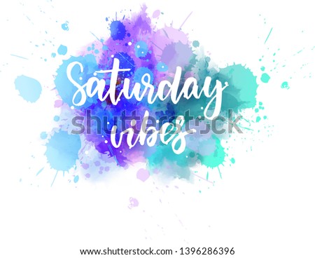 Saturday vibes - handwritten modern calligraphy lettering text on abstract watercolor paint splash background.