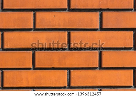 Texture of a brown brick wall background.