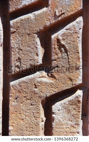 brown stone or marble wall texture with cracks and patterns