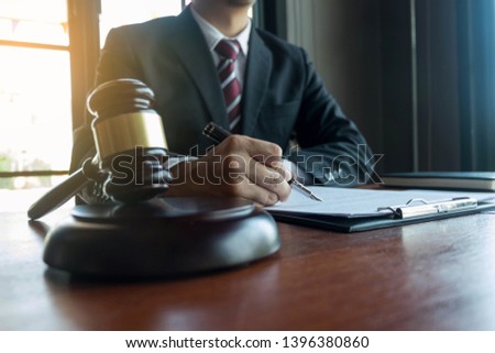 Lawyer working on the table in office. consultant lawyer, attorney, court judge, concept.