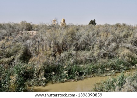 Distant View of St. John the Baptist Orthodox Church with River Jordan in Foreground