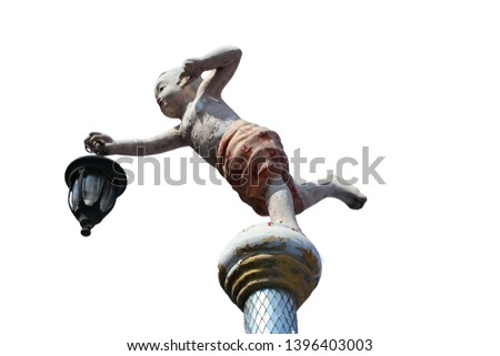 Statue of a child holding a lamp
