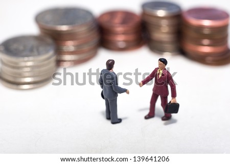 Two small business men making a deal