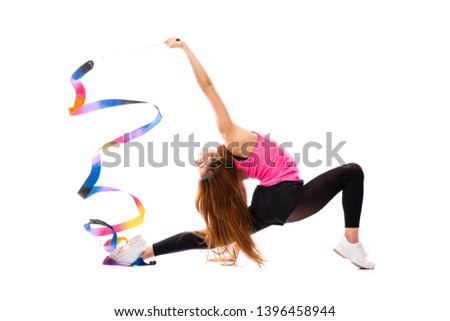 Girl doing rhythmic gymnastics over isolated background