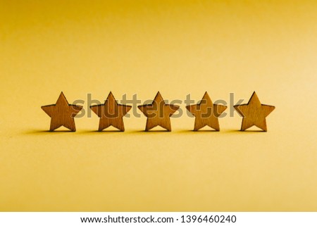 Five stars on the yellow background.