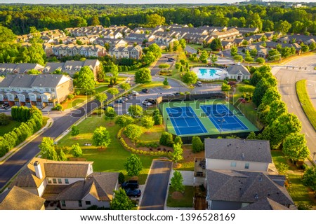 Aerial picture suburban gated community southern united states during sunset