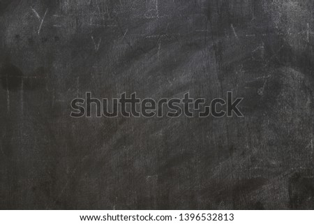 Old black background. Blackboard. Chalkboard texture