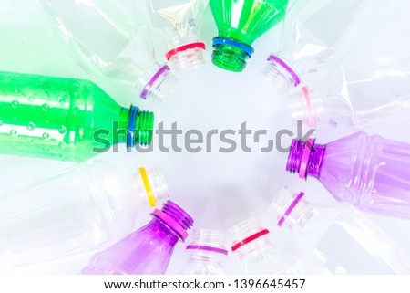 multicolored plastic bottles. recycling To conserve the environment concept. on white background