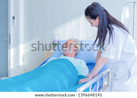 The doctor is diagnosing the patient on the bed