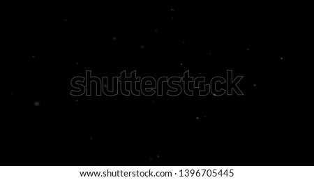 Flying dust particles on a black background