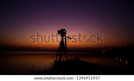 The camera shadows that are shooting from nature from the sunset light in the evening may be used as a background