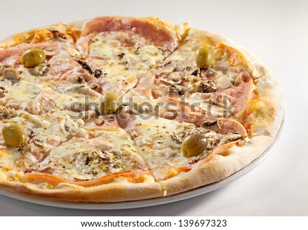Pizza called Margarita, classical style, just hum, cheese and olives as ingredients, studio isolated.