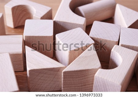 A studio photo of wooden blocks