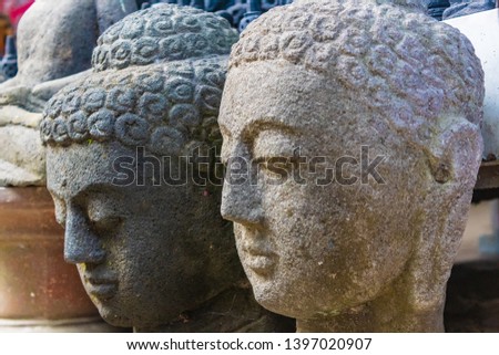 Two Buddha heads sold in Borobudur Temple, Magelang, Indonesia.