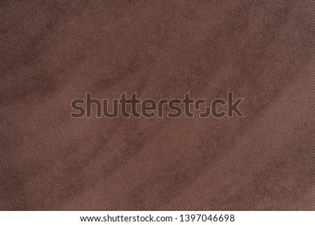 Texture of brown fabric background. Fabric surface for banner background. Top view.