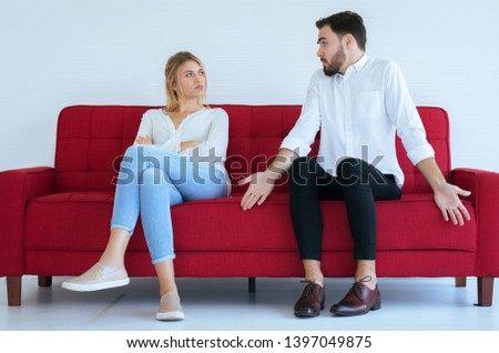 Husband hot tempered quarreling with wife conflict and boring two couple in the living room,Negative emotions