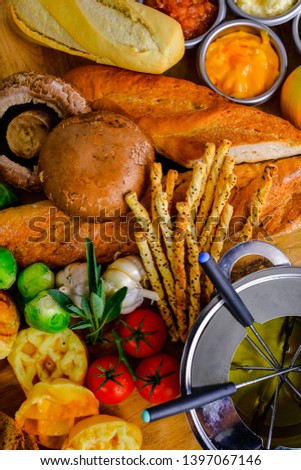 Fresh vegetables and fresh tomato,brussels sprouts, bread, cinnamon rolls, picture placement, still light, shadow