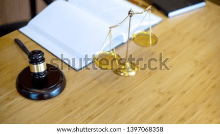 Lawyer firm office, gavel and balance on the table with book background concept law firm 
