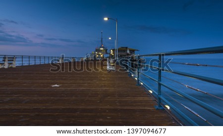 Dawn sky Santa Monica pier Los Angeles California coast early morning