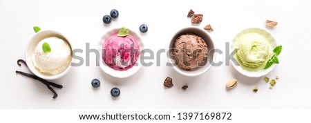 Ice Cream Assortment. Various ice creams and ingredients on white background, banner. Frozen yogurt  in cups - healthy summer dessert.