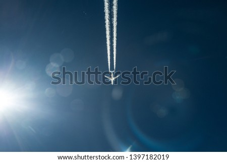 Airplane contrail while cruising altitude