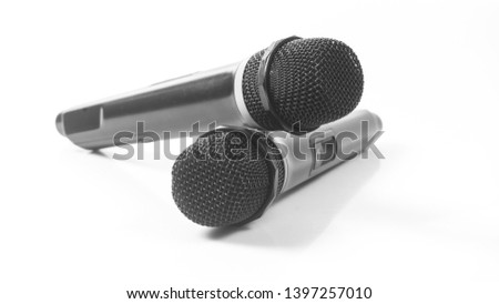 Cordless microphone. Black and white. Concept of singing and public speaking.