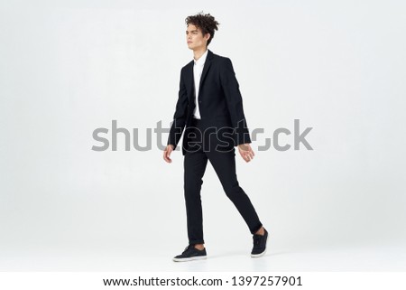 Cute business man in an office style work suit