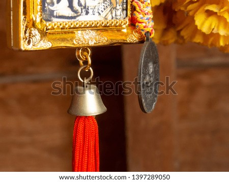 close up the bell and some picture which signature of Buddhism day festival