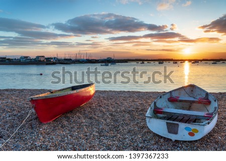 Boats on the mouth of the river Deben at Bawdsey near Felixstowe on the Suffolk coast Royalty-Free Stock Photo #1397367233