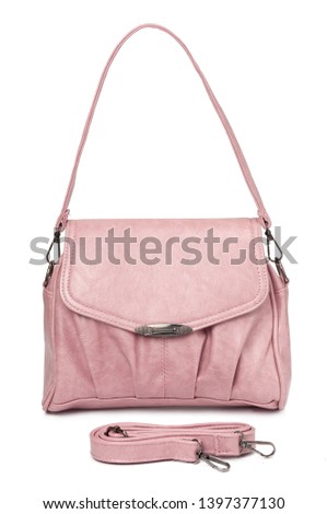 Little pink female handbag isolated on white background