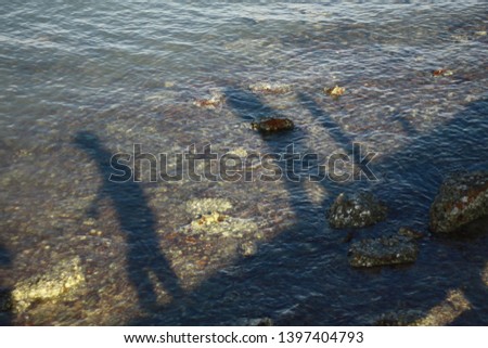 Abstract the shadow of two people on the sea floor,Black silhouette on Halloween,