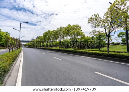 empty asphalt road in urban