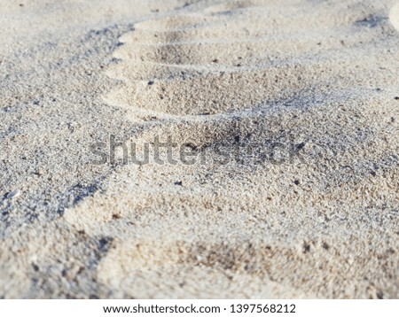 Sand on the beach with little depth of field. Picture taken on the beach of Benidorm, Spain