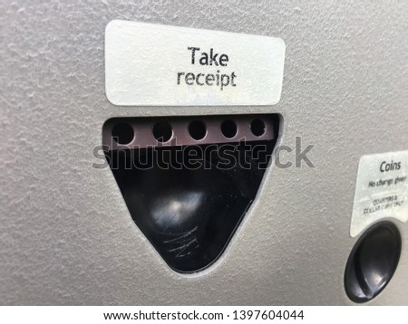 Parking payment kiosk pay buttons press take receipt english languag selection spanish german french insert credit card remove quickly cancel print red green coins keypad meter