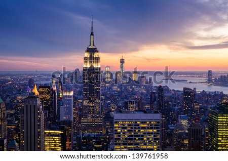 New York City with skyscrapers at sunset Royalty-Free Stock Photo #139761958