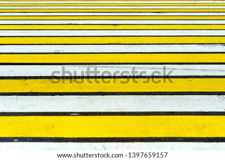empty yellow-white pedestrian crossing with vignette